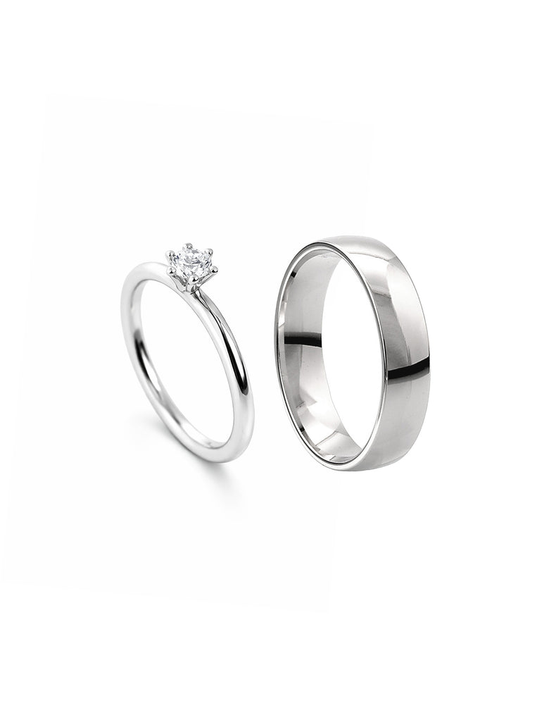 Förlovningsringar i set till dam och herr. silverring och diamantring