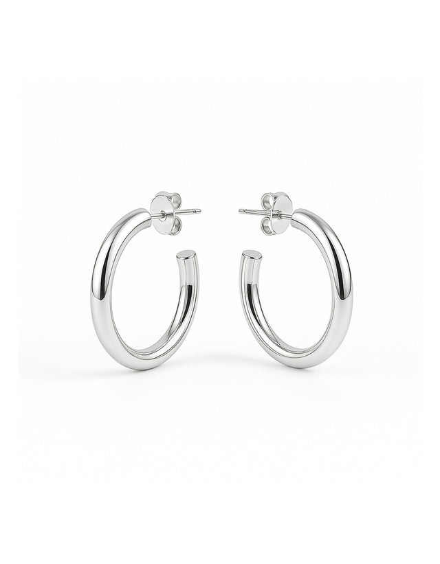 silverörhängen med blanka ringar