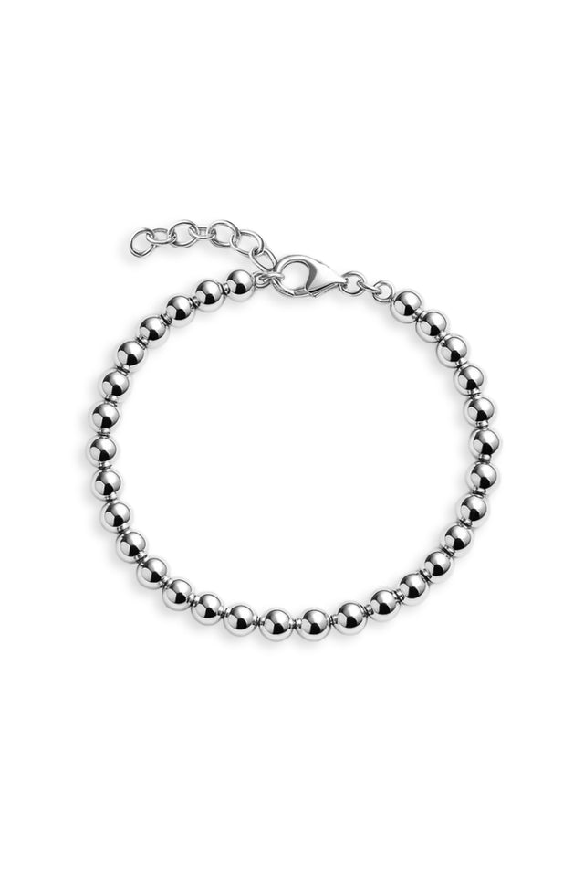 silverarmband med kulor och förlängningskedja.