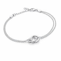 Armband i 925 silver till dam med kedjor och två sammankopplade ringar. 