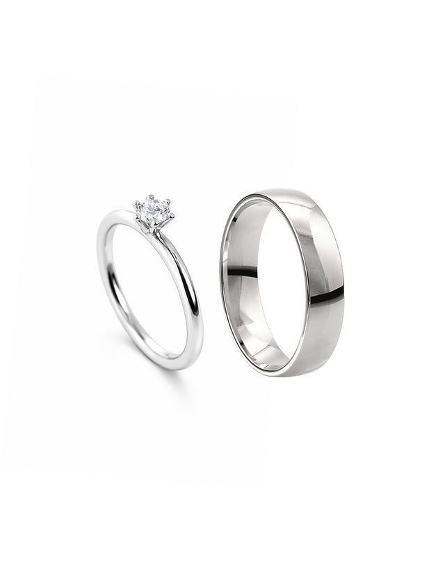 Förlovningsringar i set till dam och herr. silverring och diamantring